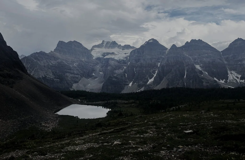 Mountain range with alpine lake