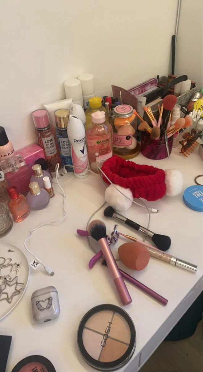 Makeup products spread out with no organisation