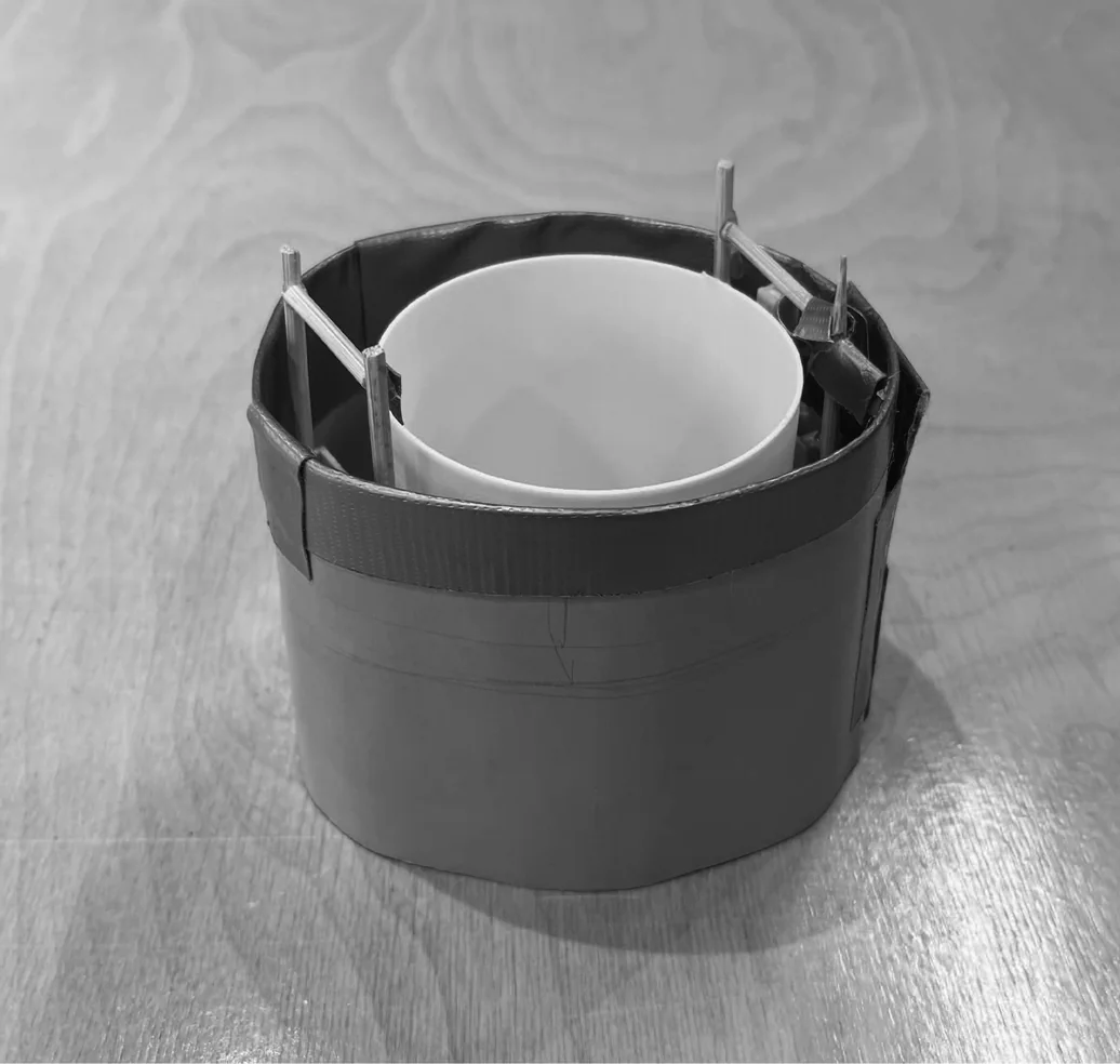 3D-printed top ring assembly — the disc connecting LED module to aluminium extrusions