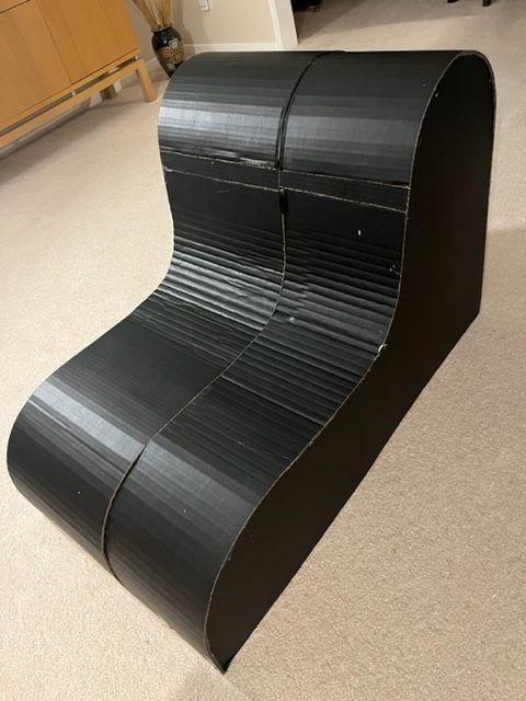 Finished black cardboard shell of the chair base